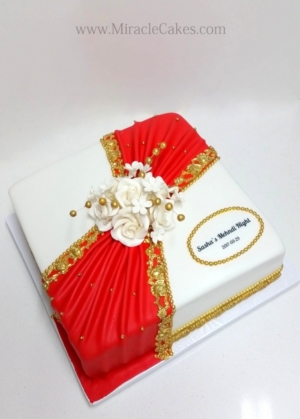 Red and Gold detailed bridal shower cake 