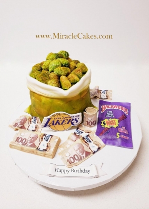 Cannabis theme cake with edible bills