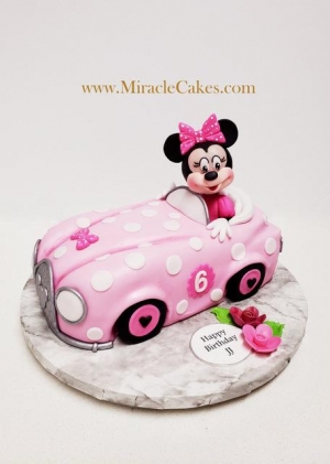 Minnie mouse riding a car 3D cake