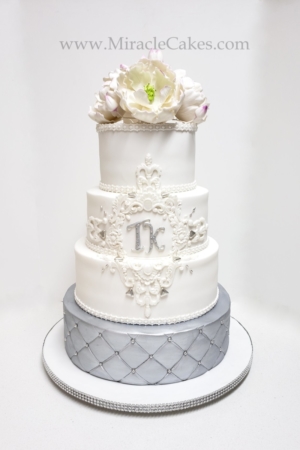 Silver and white wedding cake with gum paste Peonies